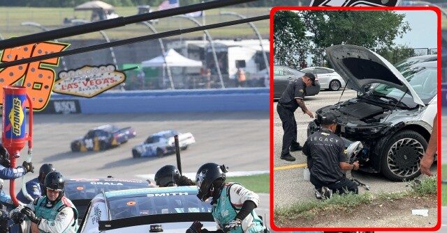NextImg:PHOTOS: NASCAR Pit Crew Fixes Car Damaged in Accident in Chicago