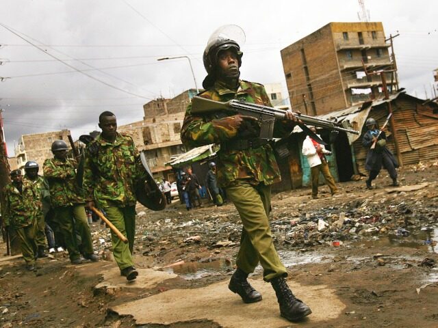 NAIROBI, KENYA - JANUARY 20: (ISRAEL OUT) Kenyan police patrol during clashes in the Matha