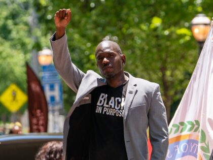 ATLANTA, GA - JUNE 18: Khalid Kamau, Mayor of South Fulton, Georgia, raises his fist while