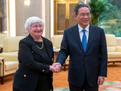 Chinese Premier Li Qiang, right, shakes hands with Treasury Secretary Janet Yellen, left, during a meeting at the Great Hall of the People in Beijing, China, Friday, July 7, 2023. (AP Photo/Mark Schiefelbein, Pool)