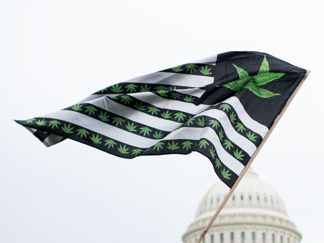UNITED STATES - APRIL 24: A U.S. flag redesigned with marijuana leaves blows in the wind a