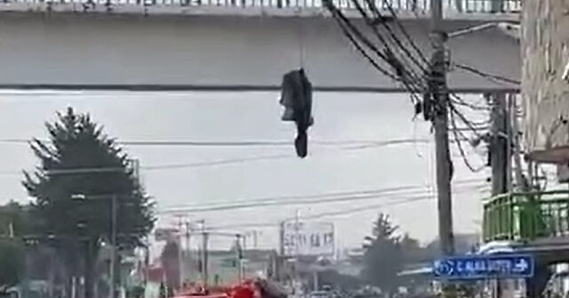 Gunmen Hang Dismembered Body from Overpass in Central Mexico