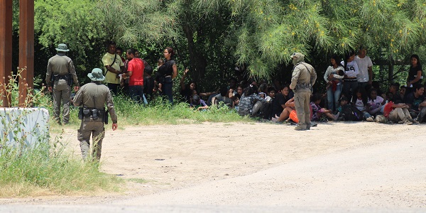 Texas DPS troopers detain a group of migrants near Eagle Pass, Texas. (Randy Clark/Breitbart Texas)