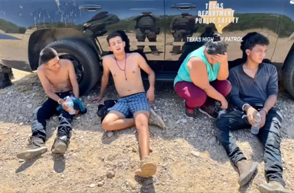 Troopers arrest four migrants who bailed out of a suspected human smuggler's vehicle during a pursuit in Webb County. (Texas Department of Public Safety Video Screenshot)