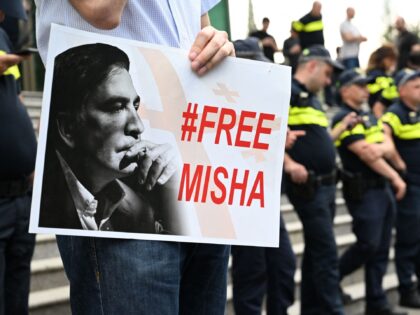 Supporters of Georgia's jailed ex-president Mikheil Saakashvili rally outside a clinic, where the politician is being held, to demand his liberation in Tbilisi on July 4, 2023, a day after he appeared extremely emaciated in a court hearing. (Photo by Vano SHLAMOV / AFP) (Photo by VANO SHLAMOV/AFP via Getty …