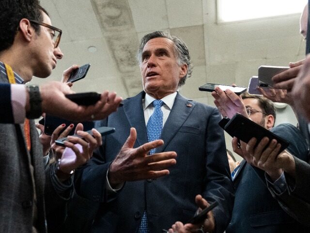 WASHINGTON, DC - MARCH 14: Sen. Mitt Romney (R-UT) speaks to reporters in the Senate subwa