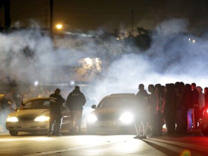 LOS ANGELES, CA - APRIL 15: Illegal Street racing activities on Ana Street in Compton on April 13, 2015. One of the several illegal street racing locations racers raced. (Photo by Lawrence K. Ho / Los Angeles Times via Getty Images)