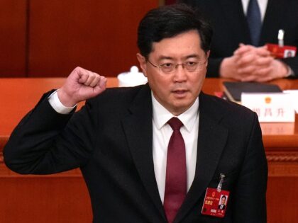 Then newly elected Chinese Foreign Minister Qin Gang takes his oath during a session of Ch