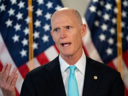 UNITED STATES - AUGUST 5: Sen. Rick Scott, R-Fla., talks to the press as he makes his way to the Senate Republican luncheon in the Hart Building on Wednesday, Aug. 5, 2020. (Photo by Caroline Brehman/CQ-Roll Call, Inc via Getty Images)