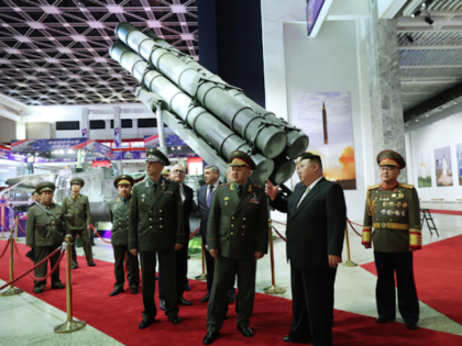 Kim Jong-un and Russian Defense Minister Sergei Shoigu tour a weapons exhibit in Pyongyang, North Korea, June 26, 2023.