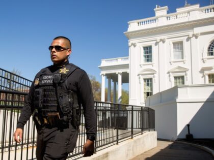 A member of the uniformed Secret Service walks near the press briefing room and the North Lawn of the the White House in Washington, Monday, March 28, 2016, after a U.S. Capitol Police officer was shot Monday at the Capitol Visitor Center complex, and the shooter was taken into custody. …