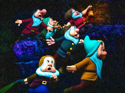 Anaheim, CA - May 03:The seven Dwarfs caught in a rain storm as darkness descends on Snow