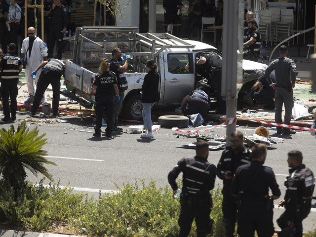 TEL AVIV, ISRAEL - JULY 04: Israeli security and rescue forces examine the scene of a terr