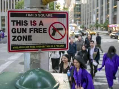 A sign informing people, "This is a Gun Free Zone," is in midtown Manhattan in New York Ci