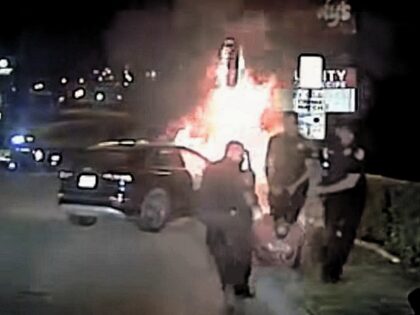 White Settlement Texas Police officers save victim from a burning car. (White Settlement P