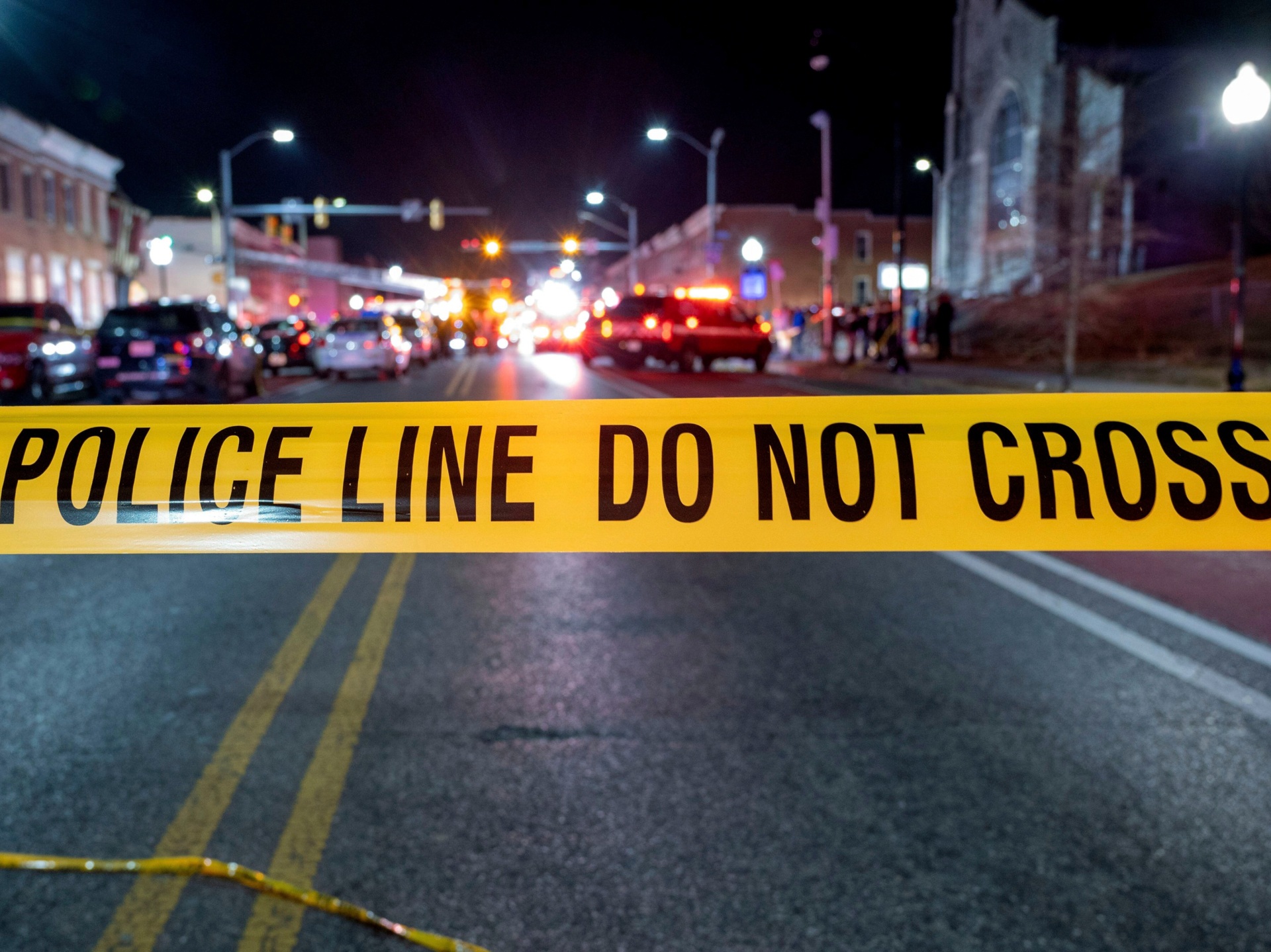 CAPTION CORRECTION: IMAGE IS A FILE IMAGE FROM A PREVIOUS EVENT: In this photo released by the Baltimore Police Department, police tape cordons off the area of a mass shooting incident in the Southern District of Baltimore, Maryland, early Sunday, July 2, 2023. Police say a number of people were killed and dozens were wounded in a mass shooting that took place during a block party just after midnight. (Baltimore Police Department via AP)
