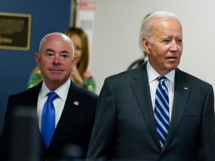 President Joe Biden, FEMA Administrator Deanne Criswell and Homeland Security Secretary Alejandro Mayorkas arrive for a briefing about the impact of Hurricane Ian during a visit to FEMA headquarters, Thursday, Sept. 29, 2022, in Washington. (AP Photo/Evan Vucci)