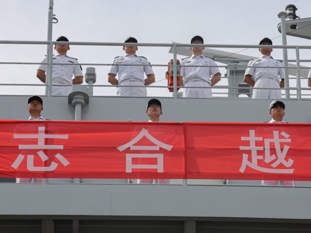 Major General Su Yingsheng's Chinese navy training ship ''Qi Juguang'' is greeted by membe