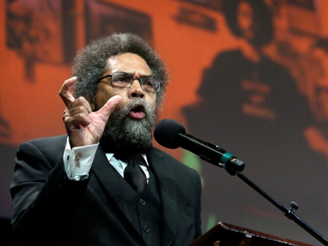 Harvard professor and philosopher Cornel West, left, address an audience in front of a pro