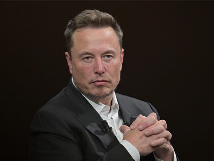 SpaceX, Twitter and electric car maker Tesla CEO Elon Musk looks on as he speaks during hi