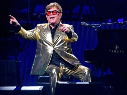 GLASTONBURY, ENGLAND - JUNE 25: Sir Elton John performs on the Pyramid stage during day 5