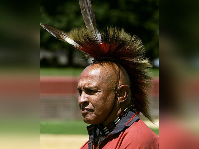 Ted Wood of Richmond, Va., an Abenaki Indian, wears a tribal headdress at a demonstration