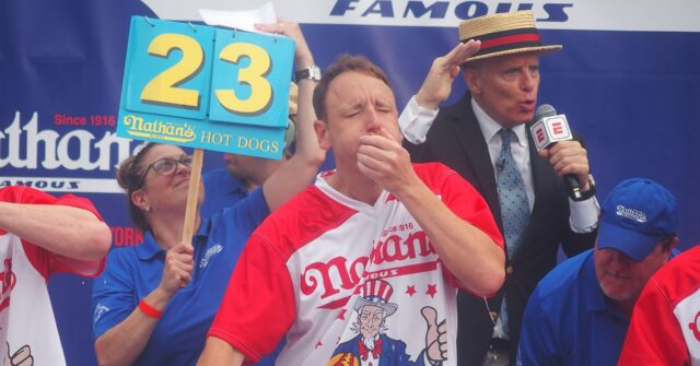 Joey Chestnut Wins Again, Defies Rain Delay to Defend Title at Nathan’s Fourth of July Hot Dog Eating Contest