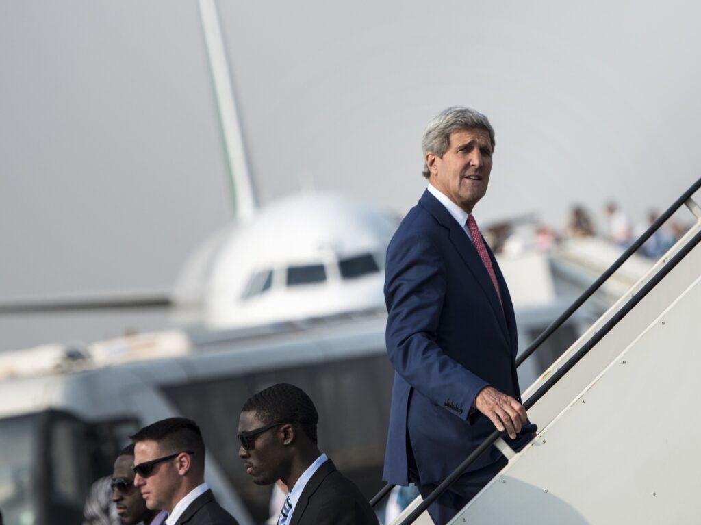 US Secretary of State John Kerry boards his plane at Cairo International Airport on September 13, 2014 as he leaves the Egyptian capital. Kerry said Egypt was on the frontline in fighting "terrorism" after meeting its leadership for support against Islamic State jihadists in Iraq and Syria. AFP PHOTO/POOL / BRENDAN SMIALOWSKI (Photo credit should read BRENDAN SMIALOWSKI/AFP via Getty Images)