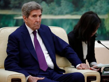 BEIJING, CHINA - JULY 18: U.S. climate envoy John Kerry meets with Chinese Premier Li Qiang (not pictured) in the Great Hall of the People on July 18, 2023 in Beijing, China. Kerry is in Beijing to restart climate negotiations between the world's two biggest polluters, which together account for …