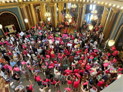 Iowa Democrat Jennifer Konfrst speaks to protesters rallying at the Iowa Capitol rotunda i