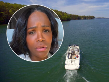 (INSET: Tameka Foster) A boat passes along Lake Lanier, April 23, 2013, in Buford, Ga. Fas