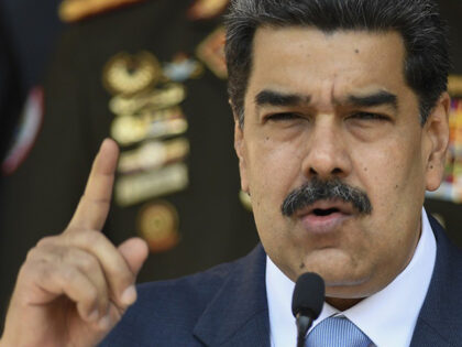 In this March 12, 2020, file photo, Venezuelan President Nicolas Maduro speaks at a press conference at the Miraflores Presidential Palace in Caracas, Venezuela. The Trump administration will announce Thursday, March 26, 2020, indictments against Maduro and members of his inner circle for effectively converting Venezuela's state into a criminal …