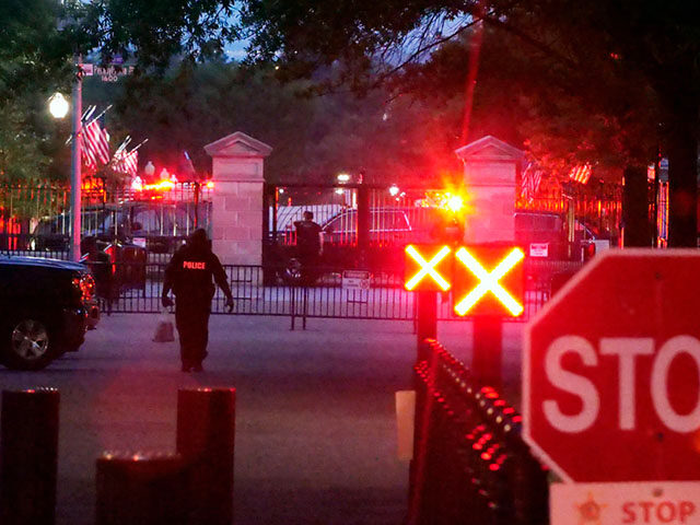 Police are seen outside the White House grounds, Sunday night, July 2, 2023 in Washington. The White House was briefly evacuated Sunday evening while President Joe Biden was at Camp David after the Secret Service discovered suspicious powder in a common area of the West Wing, and a preliminary test …