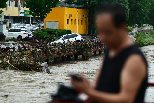 At least two people died from floods in Beijing on Monday, while another two casualties we