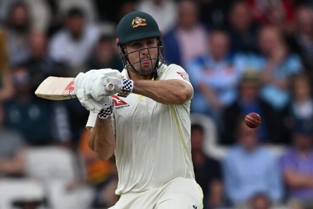 Australia's Mitchell Marsh hits a six off Mark Wood during hus hundred against England in