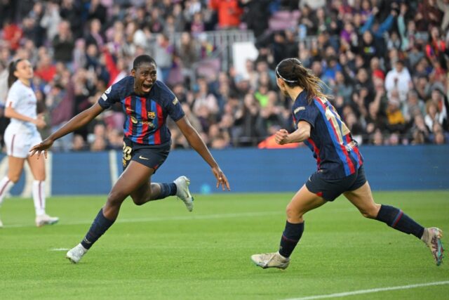 Barcelona's Nigerian forward Asisat Oshoala (L) celebrates scoring against Roma in the wom