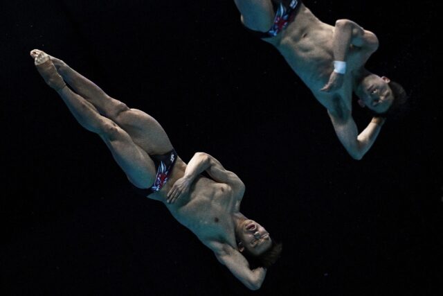 China's Long Daoyi and Wang Zongyuan compete in the final of the men's 3m synchronised div