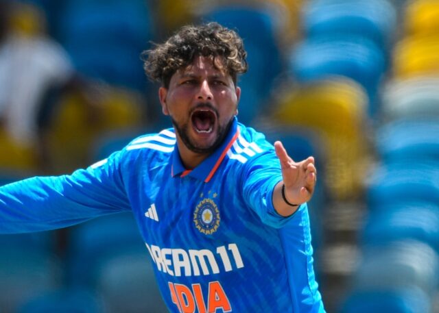 In control: Kuldeep Yadav of India celebrates the dismissal of Yannic Cariah of West Indie