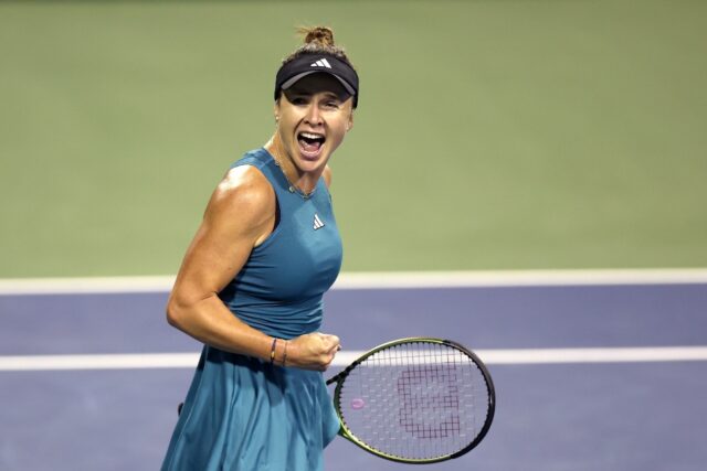 Elina Svitolina of Ukraine celebrates victory over Victoria Azarenka at the WTA Tour's Mub