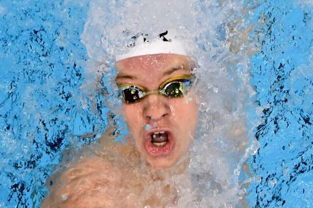 France's Leon Marchand wins the final of men's 200m individual medley for his third gold m