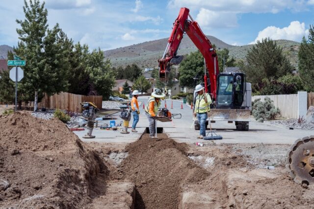 Heavy machinery is used to construct 42 new home units in Cold Springs, Nevada in June 202