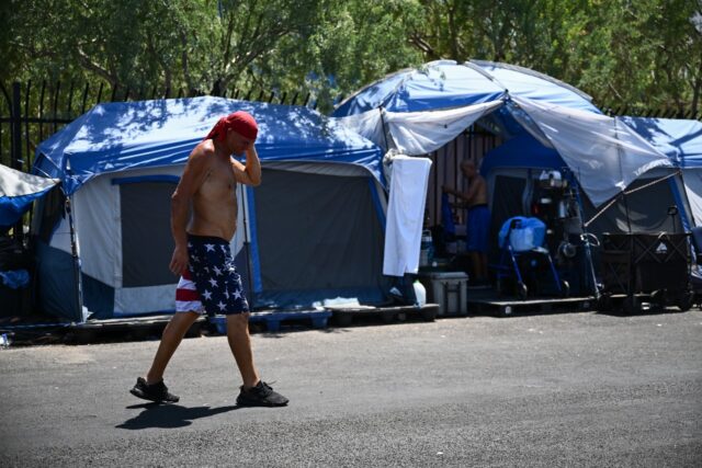 Hundreds of homeless people live in 'The Zone,' an encampment in Phoenix, the capital of t