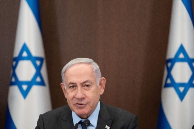 Israel's Prime Minister Benjamin Netanyahu chairing a weekly cabinet meeting