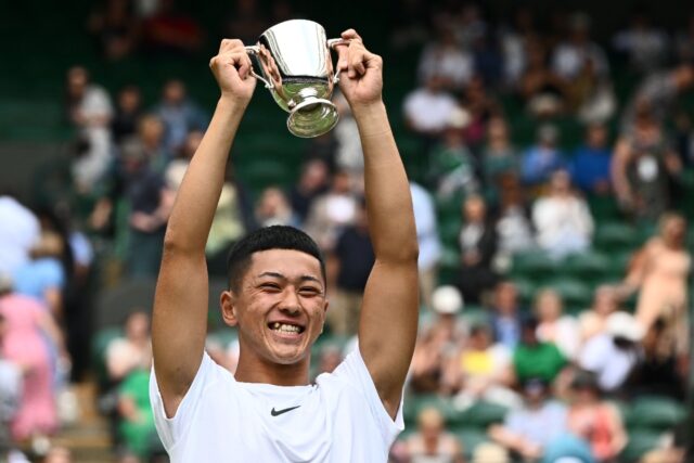 Japan's Tokito Oda with the Wimbledon wheelchair singles trophy