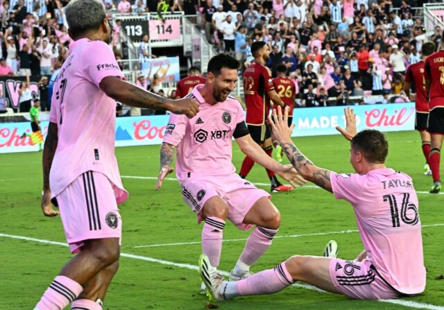 Lionel Messi celebrates scoring Inter Miami's second goal with team-mate Robert Taylor --