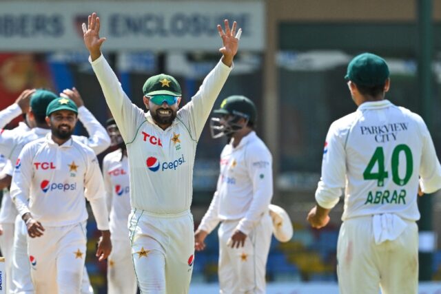 Pakistan players celebrate as they reduced Sri Lanka to 143-6 at tea on the fourth day of