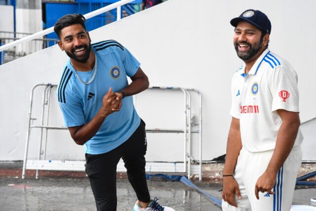 Player-of-the-match Mohammed Siraj (L) and skipper Rohit Sharma (R) after India clinched a
