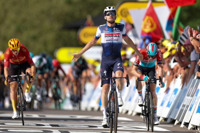 Quick-Step's Danish rider Kasper Asgreen wins from an escape