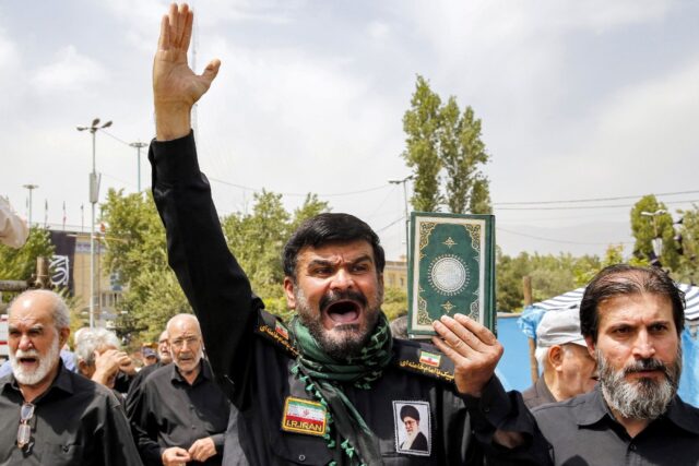 Rallies in Tehran, Baghdad and other major cities come amid heightened tensions between Ir