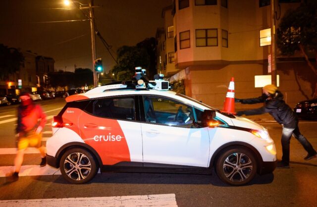 Safe Street Rebel, a group of anonymous anti-car activists, protests the spread of driverl